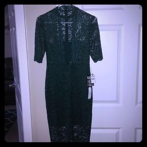 Beautiful dress!!!! Lace with see though traits.